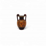 Etruscan black-figure vase with female profile