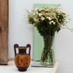 Etruscan black-figure vase with female profile