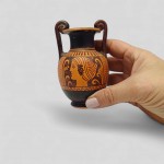 Etruscan black-figure vase with female profile